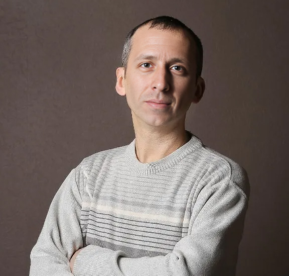 Николай